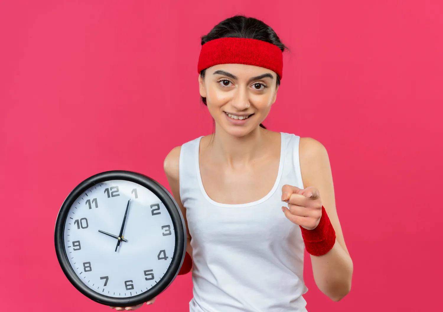 Woman checking weight on scale as part of a fast weight loss plan