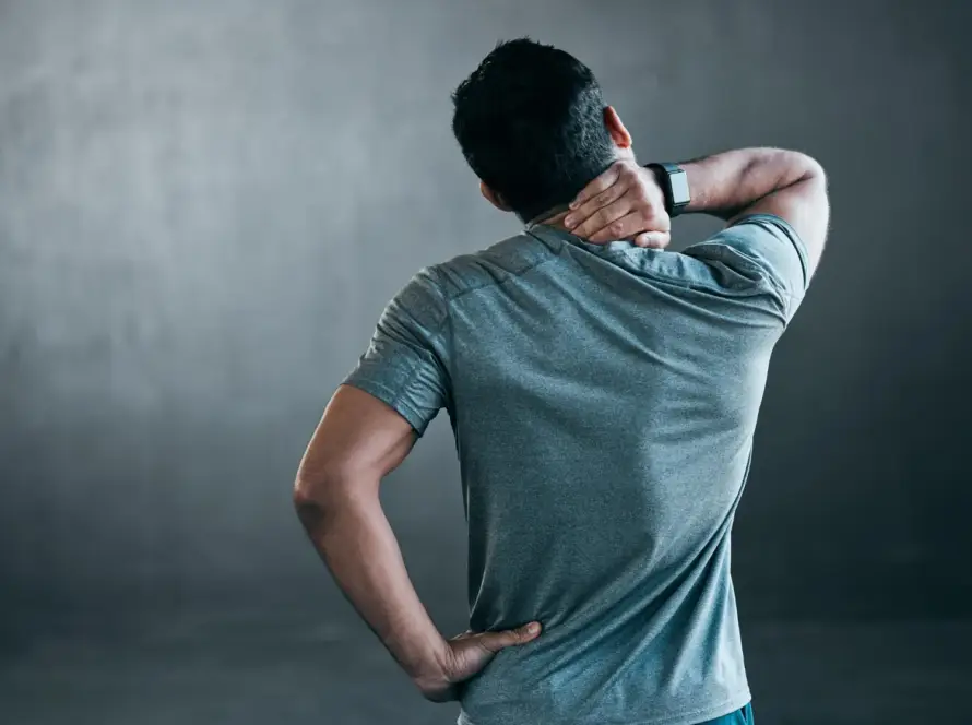 Strong, healthy person stretching their back outdoors, symbolizing a Pain-Free Human Back