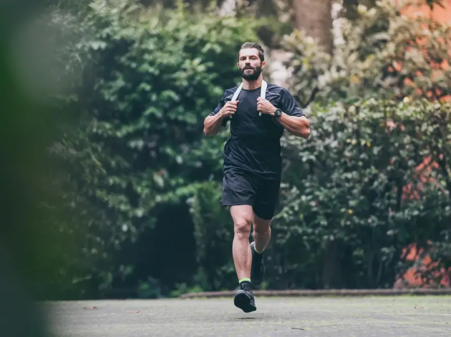 Best Fat Burning Exercises - Person doing jump squats outdoors for quick weight loss