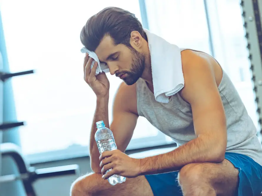 Athlete performing exercises as part of sports injury recovery program